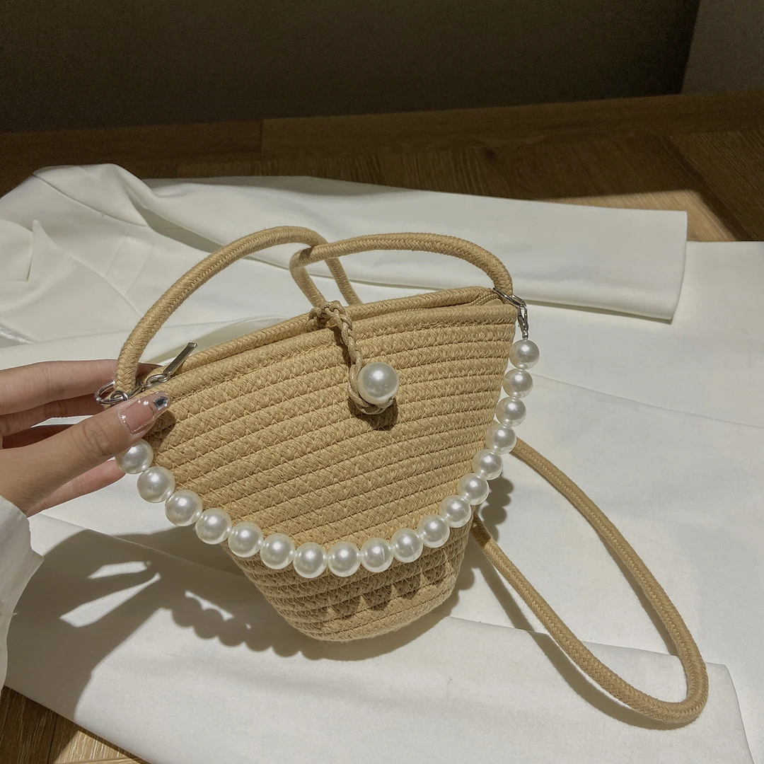 佐猫新中式草编包包女士2025新款国风斜挎小包海边沙滩包编织包女