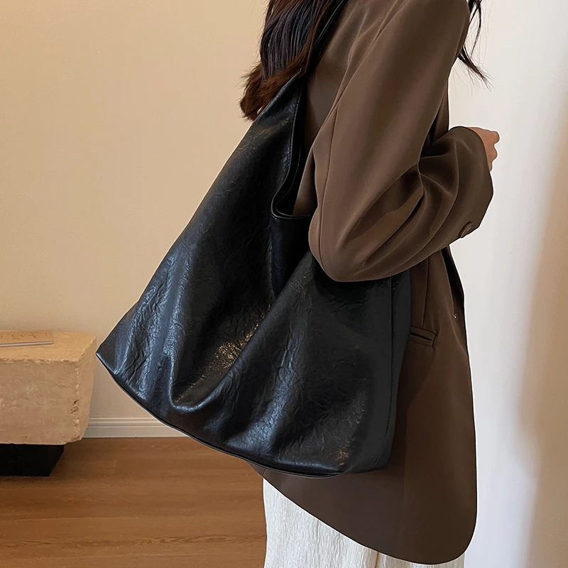 佐猫秋冬复古通勤包大容量包包女款爆款2025新款单肩托特包水桶包