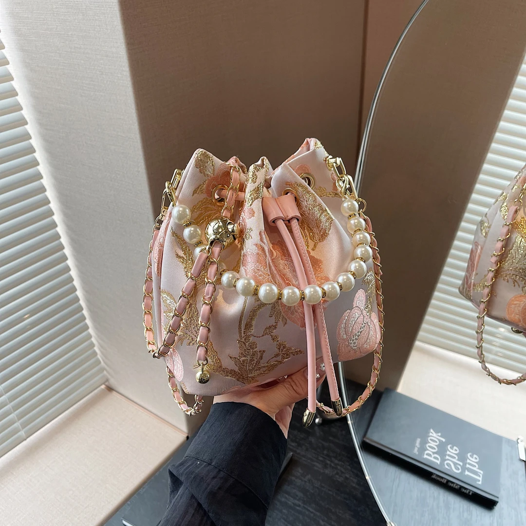 佐猫古风包包2025新款包包国风新中式水桶包高级感小众单肩斜挎包