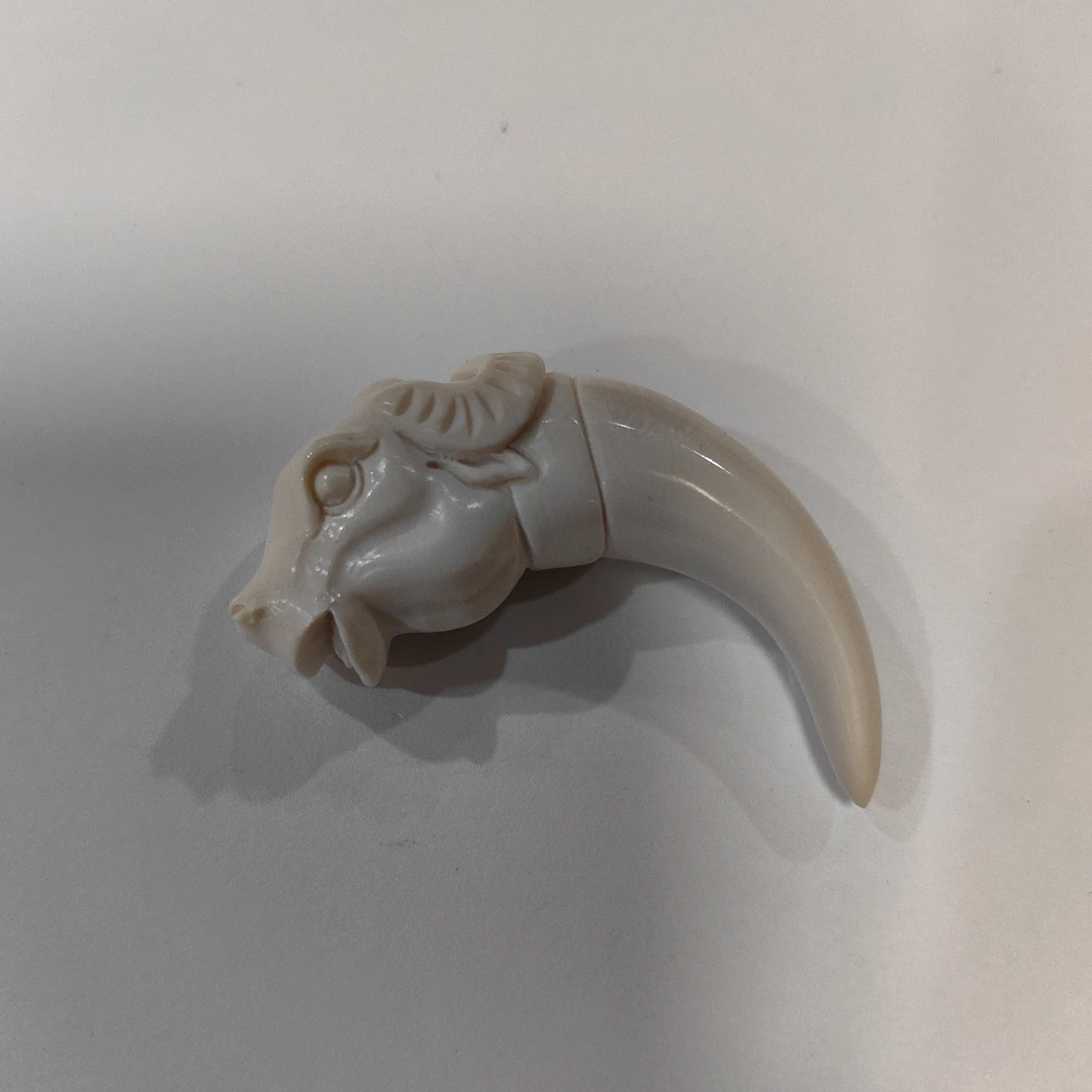 橄榄核雕刻龙牙尖约13克K88