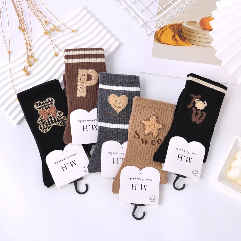 袜子女2024秋冬高筒羽毛纱刺绣棉袜网红百搭时尚个性潮流学生韩版