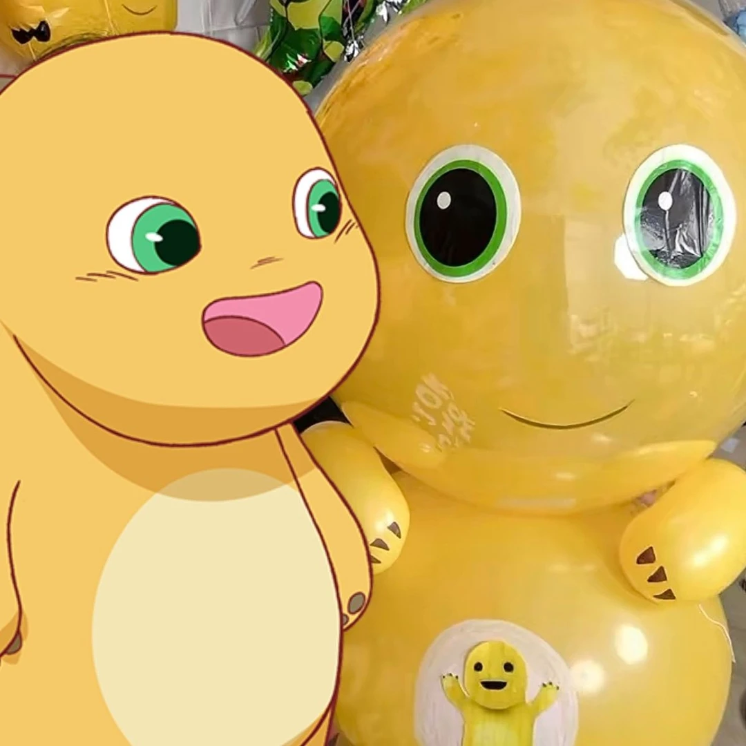 新款12寸18寸飞天气球奶龙黄卡通地摊手工可爱表情笑脸幼儿充气球