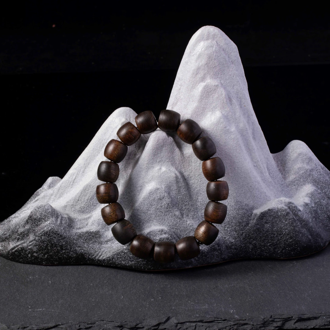 沉水黑棋楠1.2鼓珠单圈沉香手串