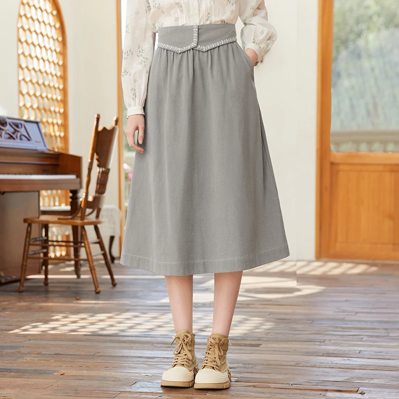 Famecoco显瘦半身裙秋时尚百搭中长款高腰a字裙FAB1HA002