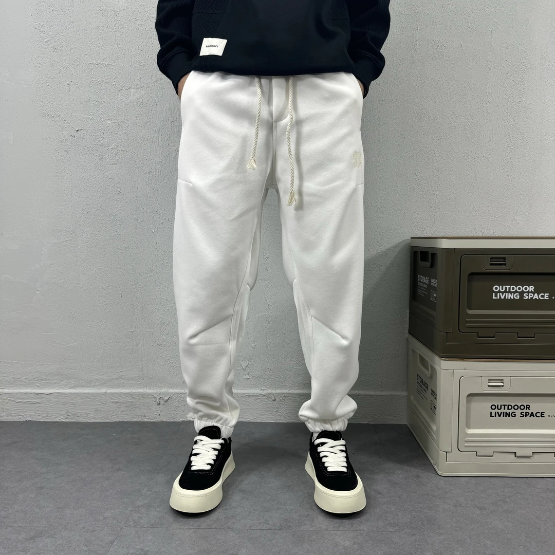 时尚纯色刺绣休闲裤男士春秋款潮牌拼接宽松百搭束脚裤弹力运动裤