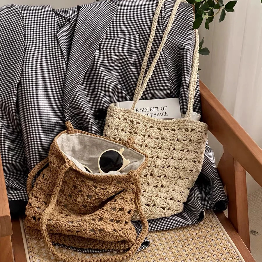 夏季镂空编织包女2024新款手工编织海边度假法式单肩水桶包百搭款