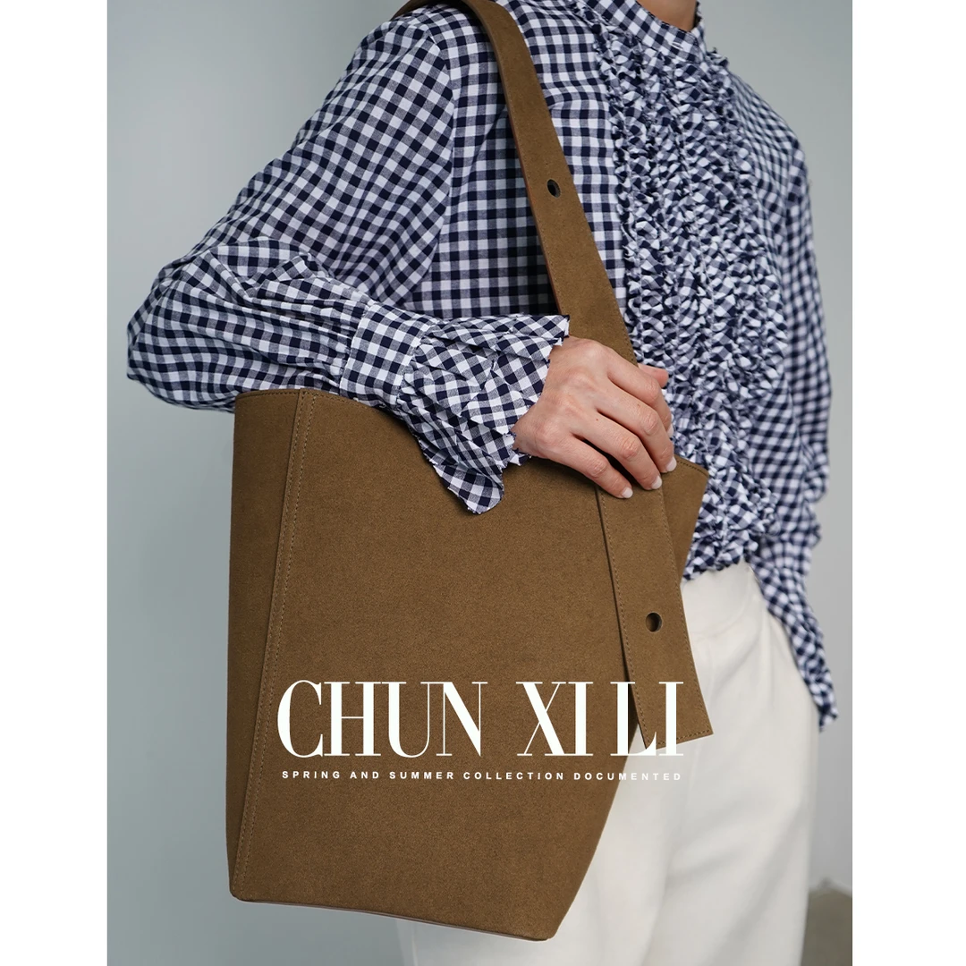 CHUNXILI/春熙里 小众设计感水桶包 秋冬时尚经典包包SPD233052