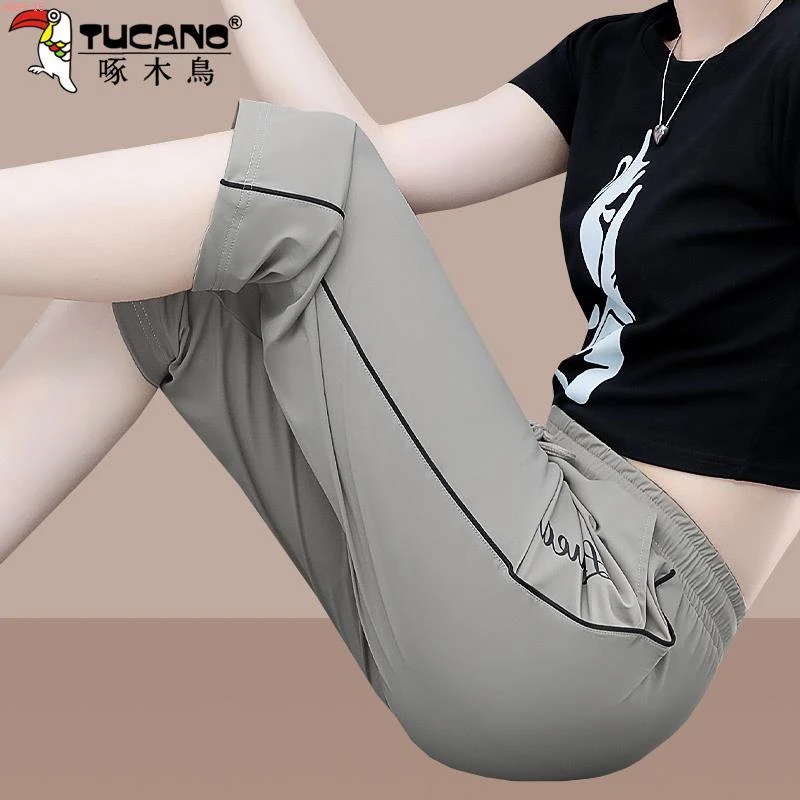 啄木鸟薄款运动卫裤女款2025新款夏季休闲七分裤冰感速干高腰中裤