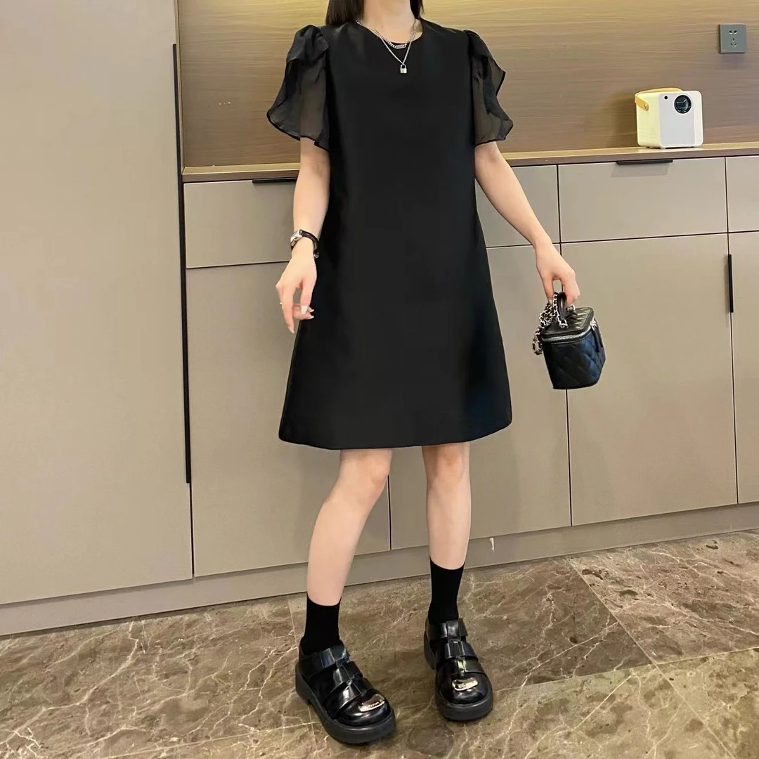 米可/MK-162-STUDIO【夏季新款】欧货木耳袖百搭黑色小众设计连衣裙