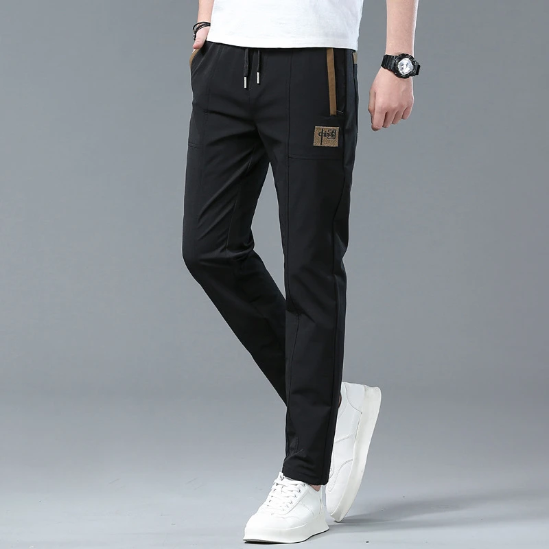 秋冬新款国潮刺绣松紧腰休闲裤男士宽松直筒加绒加厚潮牌运动裤子