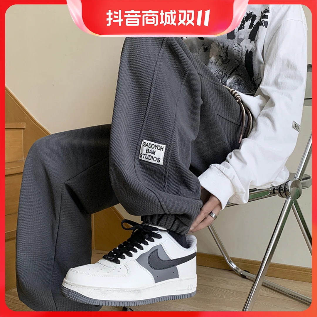 秋季男女同款百搭个性抽绳束脚休闲裤潮流大码宽松高街运动卫裤男