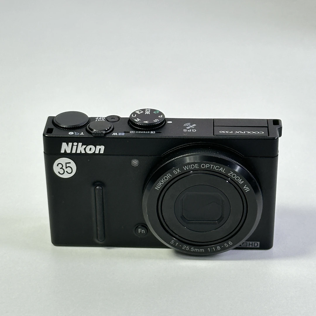 9新 Nikon/尼康 屏幕四周暗P330日英文像素1200w5倍光学变焦