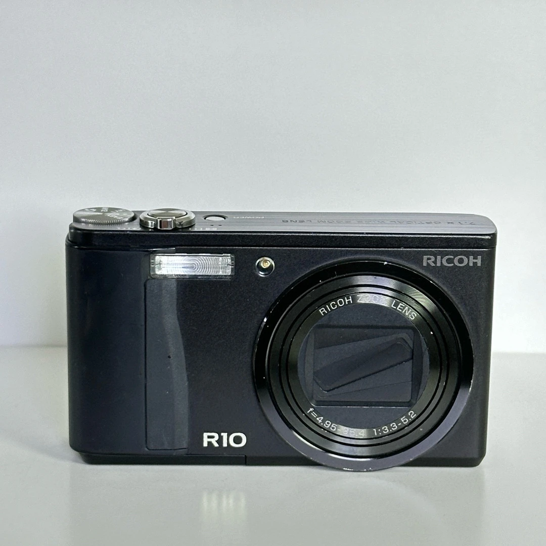 9新 Ricoh/理光 R10日英文1000w像素7.1倍变焦CCD相机