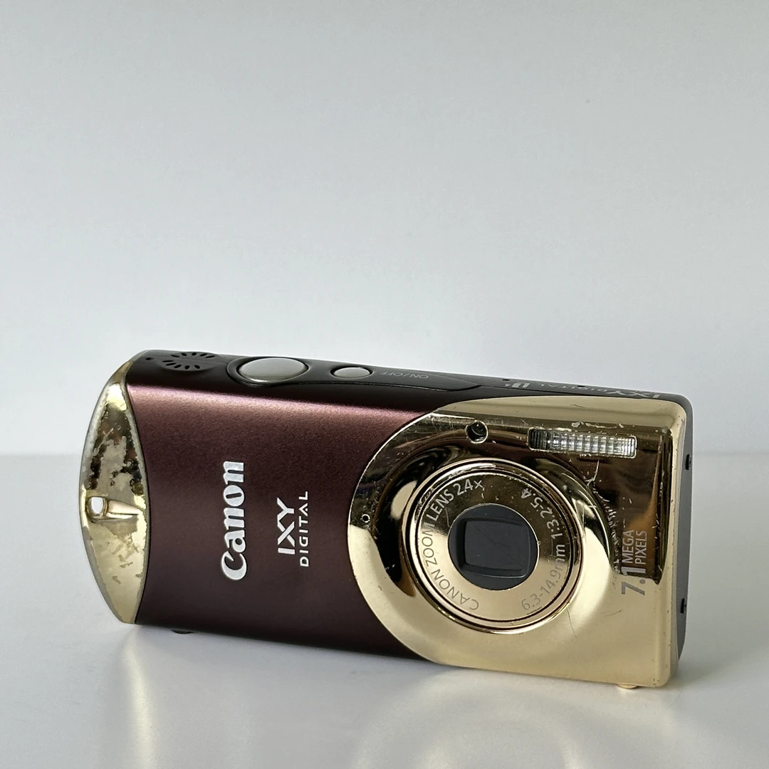 9新 Canon/佳能 ixyLi4口红机日英文710w像素2.4倍CCD相机学生