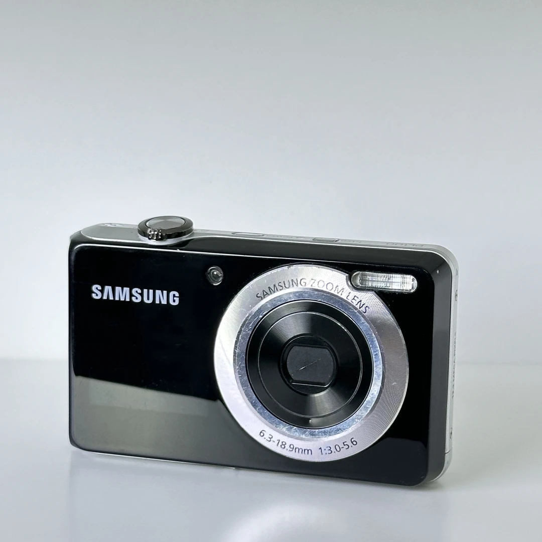 9新 Samsung/三星 PL100繁体中文双屏可自拍1220w5倍CCD相机学生