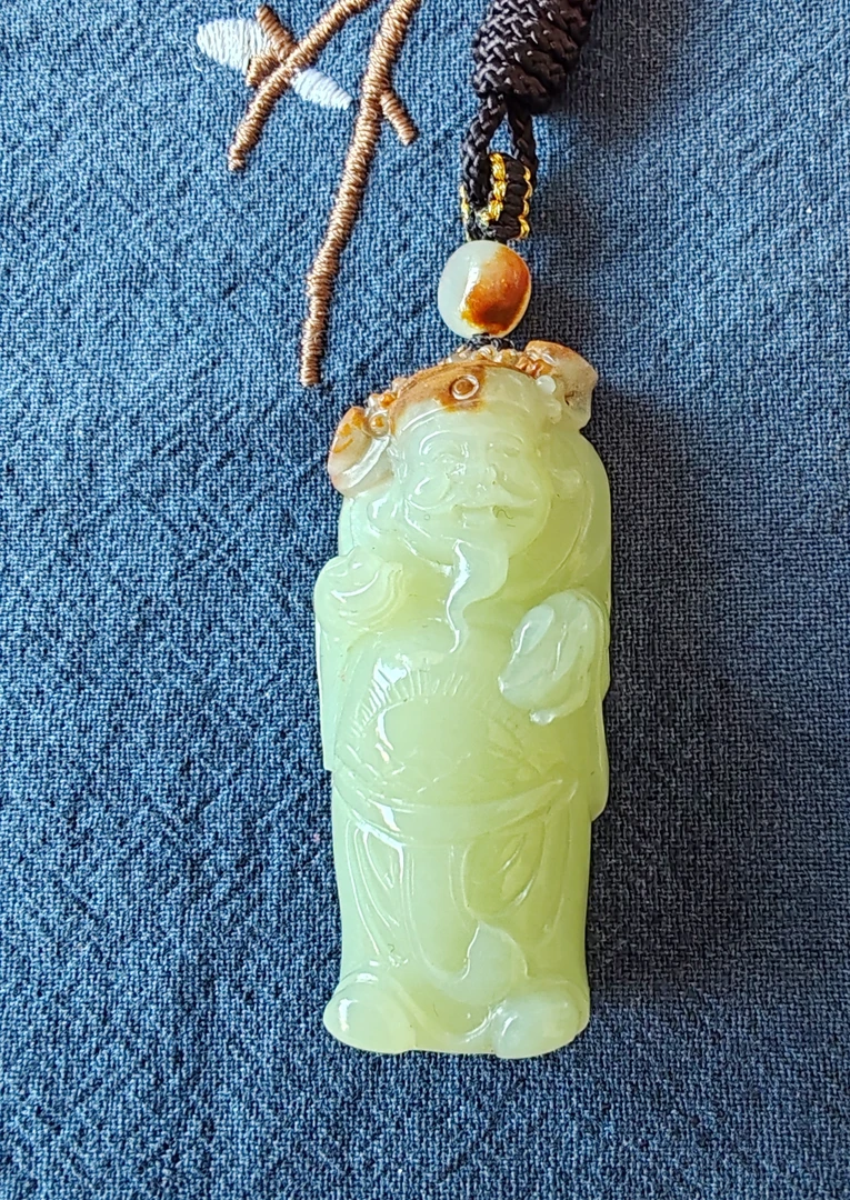 黄白河磨玉籽玉财神挂坠沁红皮籽玉