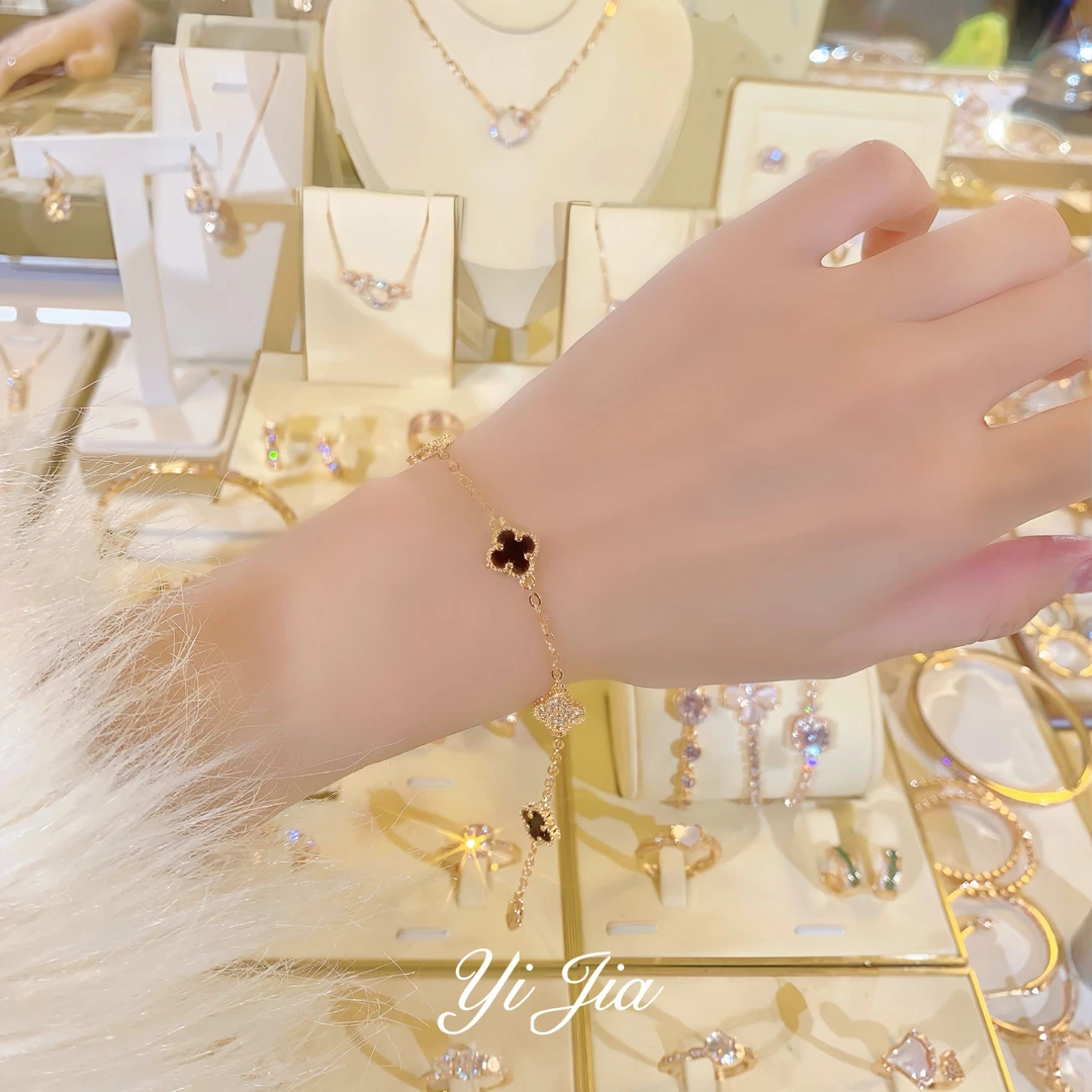 铜合金贝壳手链 四叶草黑色小众金色花花手链ins轻奢简约双面百搭