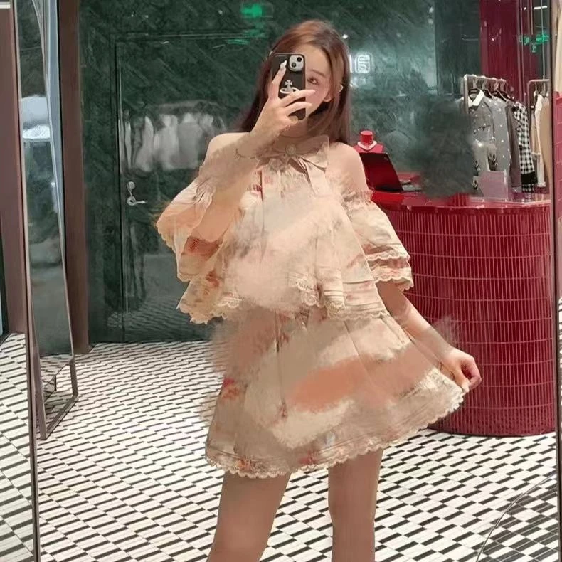 辰辰服饰二店2024夏季新款维多利亚印花半裙短外套