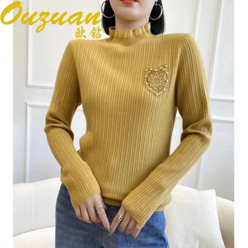 欧钻9612秋冬韩系原宿潮织花口袋打底衫