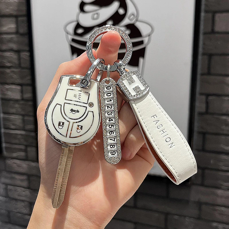 老款日产轩逸钥匙套阳光玛驰骐达途乐汽车直板钥匙包扣保护壳男女