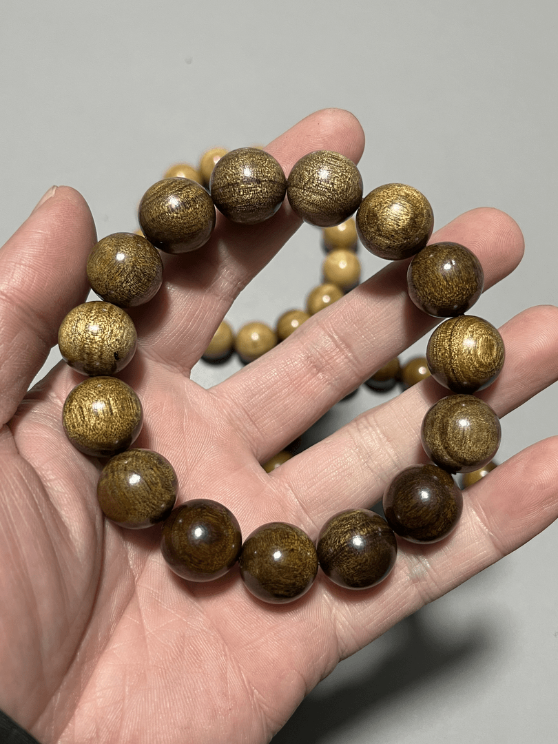 A513金丝楠1.5圆珠手串 天然材质底色多样