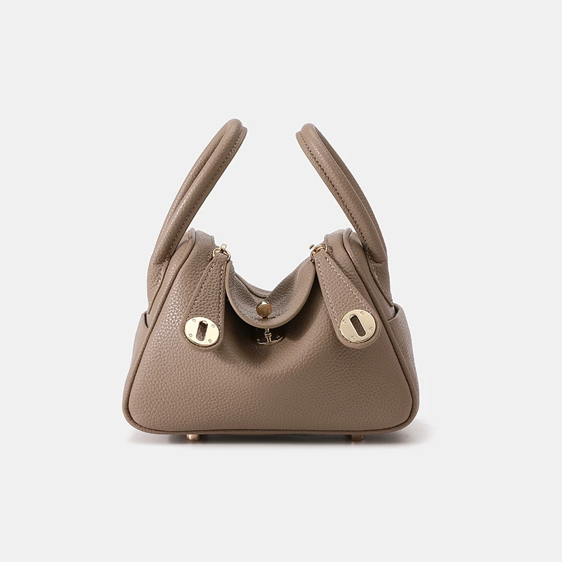 琳迪包2024新款女包手提包斜挎单肩时尚高级感通勤小包水桶医生包