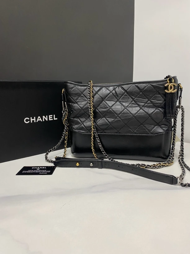95新 Chanel/香奈儿 黑金流浪包中号23开卡27cm/HK40801030