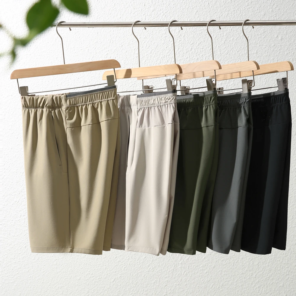 男士夏季凉感弹力透气激光打孔运动休闲短裤