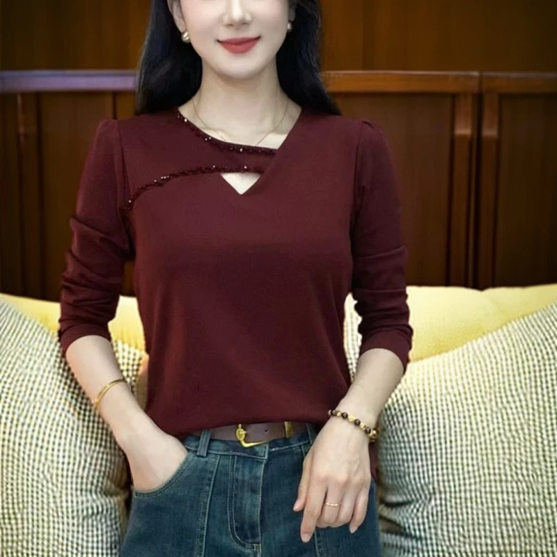 洋气新款时尚气质不规则镂空串珠长袖小衫减龄纯色显瘦打底上衣