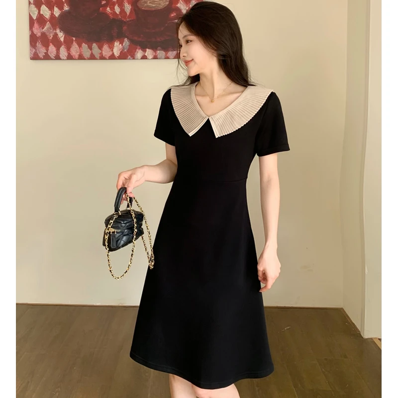 艾墨儿2024夏装新款赫本风小黑裙显瘦气质娃娃领连衣裙808