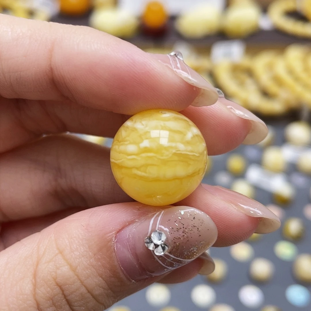 琥珀裸石未镶嵌周**飒蜜蜡圆珠16.5mm
