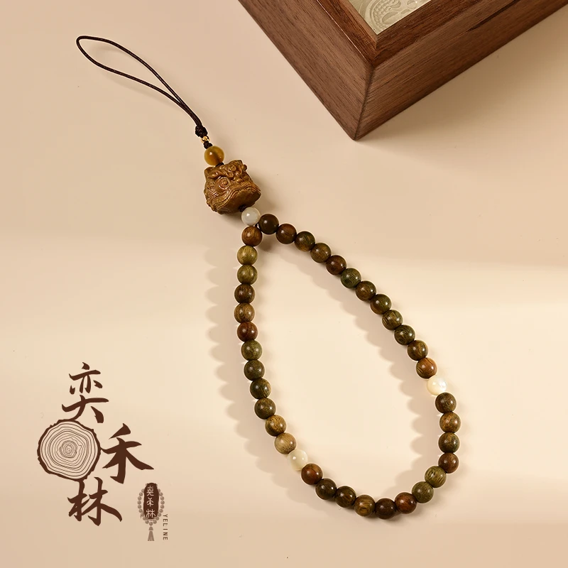 奕禾林 绿檀醒狮挂件