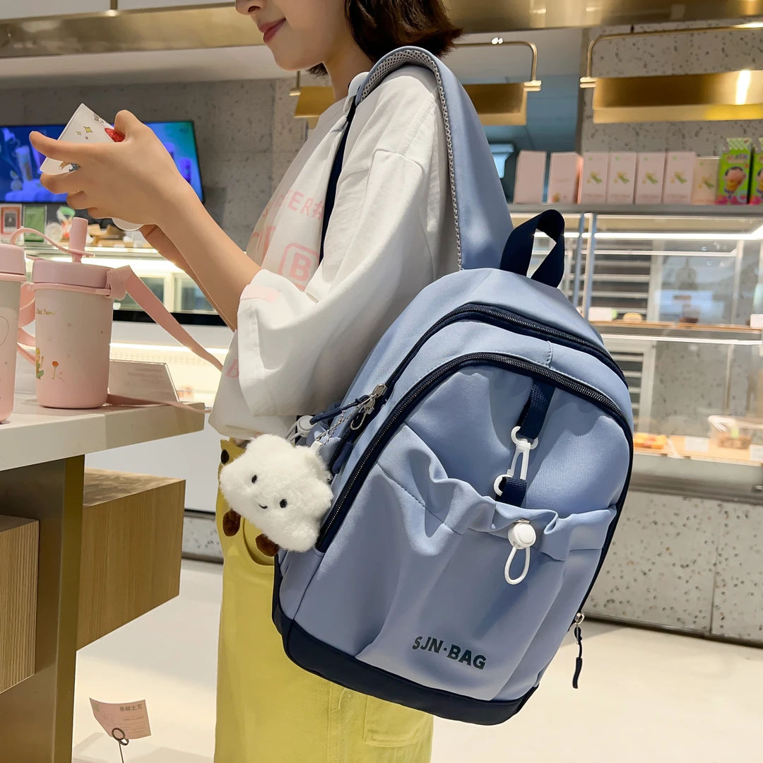 时尚潮流ins风韩版日系初中生女大学生轻便拼色英文女士双肩背包