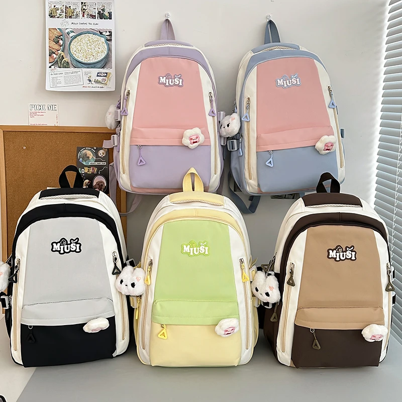 日系潮流时尚百搭初中生高中生大学生拼色竖拉链小标小狗大小背包
