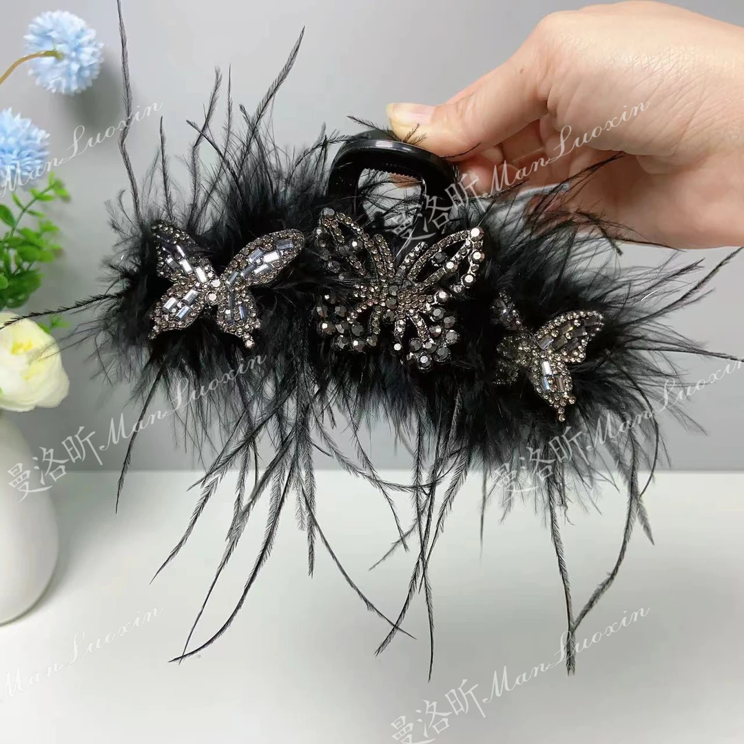 秋冬新款蝴蝶羽毛抓夹网红轻奢天然毛毛夹子后脑勺盘发鲨鱼夹发饰