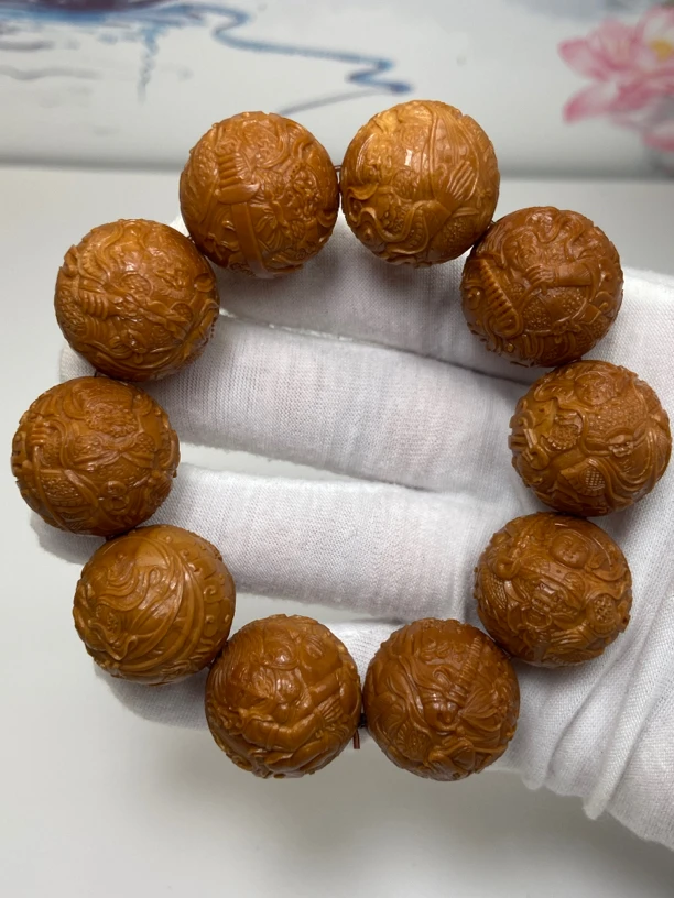 2.3正圆光珠薄意雕天上人间橄榄核手串