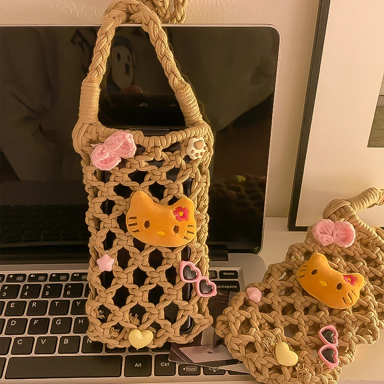 手工编织单肩斜挎包女款镂空KT猫度假遛弯手机包随身便携带收纳包