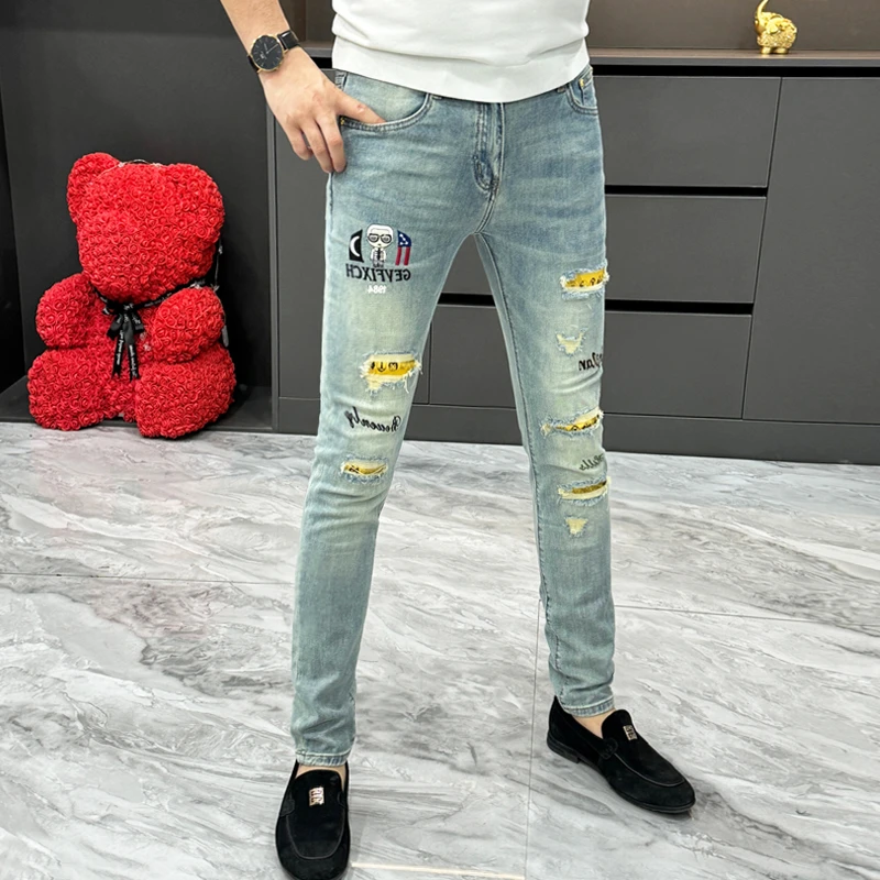 欧货潮牌破洞牛仔裤男春秋新款个性刺绣小脚裤潮流修身弹力直筒裤