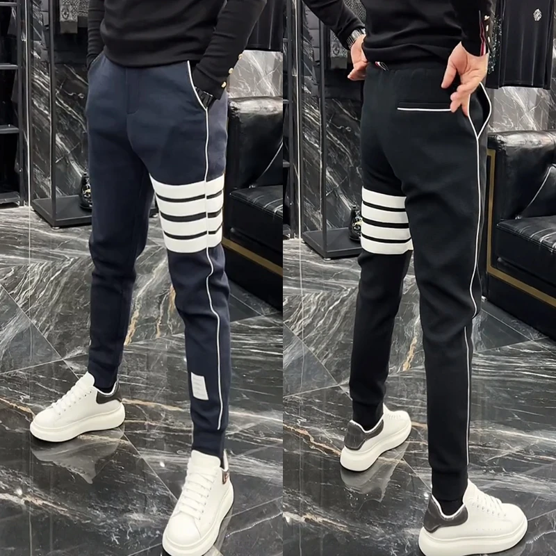 潮牌经典休闲卫裤男秋季四条杠弹力修身束脚裤青年百搭运动哈伦裤