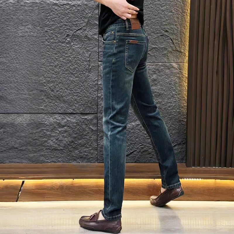男士欧货牛仔裤春秋季新款做旧修身小脚裤百搭帅气显瘦直筒裤长裤