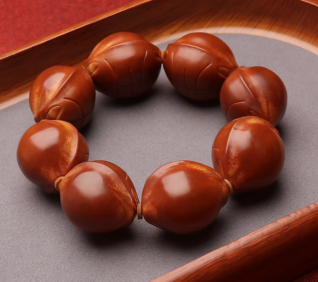 印尼大橄榄雕刻【富甲天下】尺寸：3.2×3.8cm橄榄核手串文玩手串