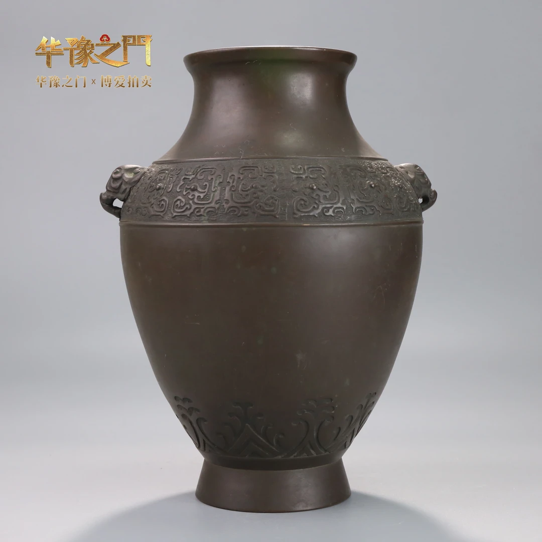 lot383清代兽耳夔龙纹铜瓶老金属器拍卖