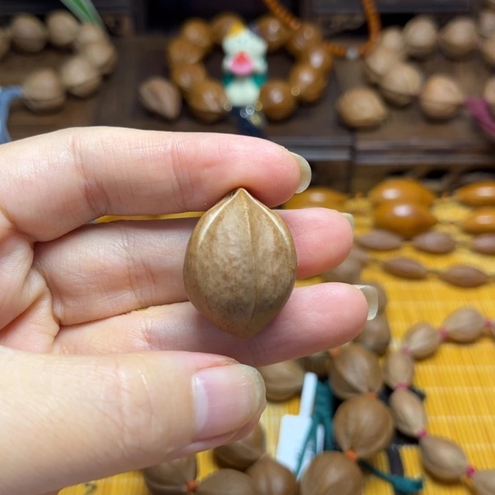 橄榄核核雕徐****鸭梅林铁核2.2*3.0单颗