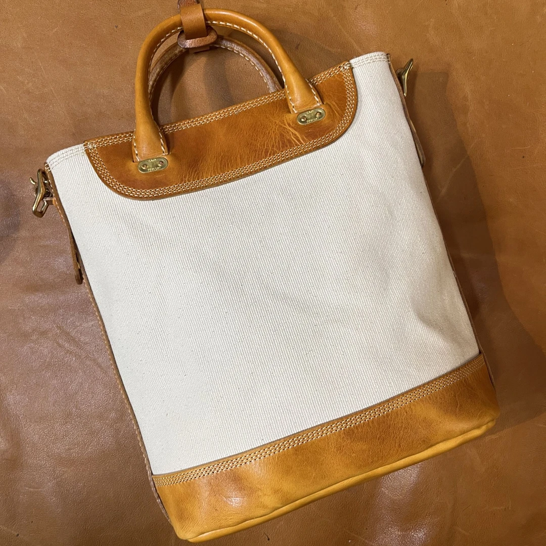 新款头层牛皮配帆布托冰包