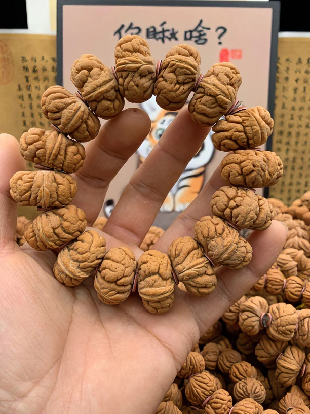 货比三家看质量三日红秦岭龙纹桃核霸王龙手串手持刹车片飞