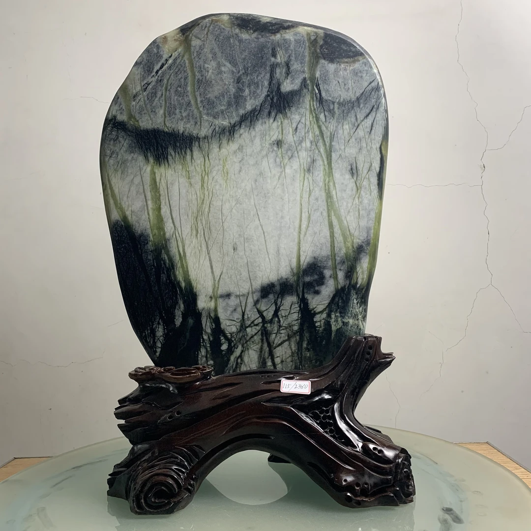 115，玉树石摆件，高55厘米长34厘米，厚3厘米，高带底座的尺寸