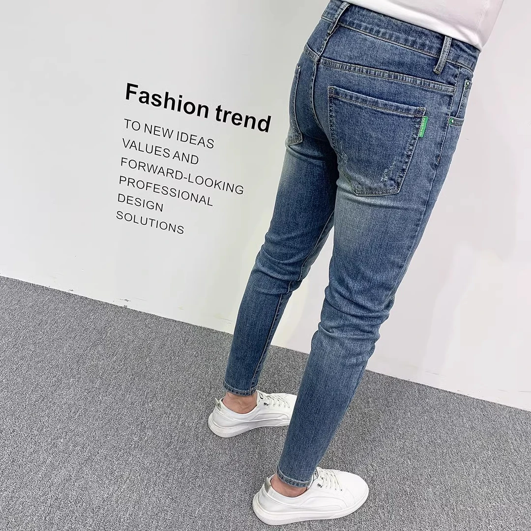 韩版蓝色牛仔裤男2025新款小脚九分裤潮流百搭修身弹力显瘦长裤