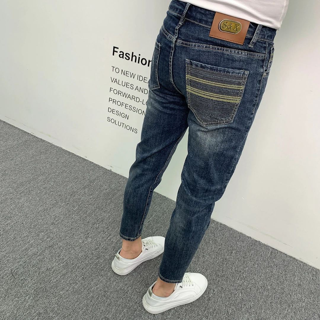 2025新款刺绣牛仔裤男潮流蓝色九分裤百搭时尚韩版修身小脚裤