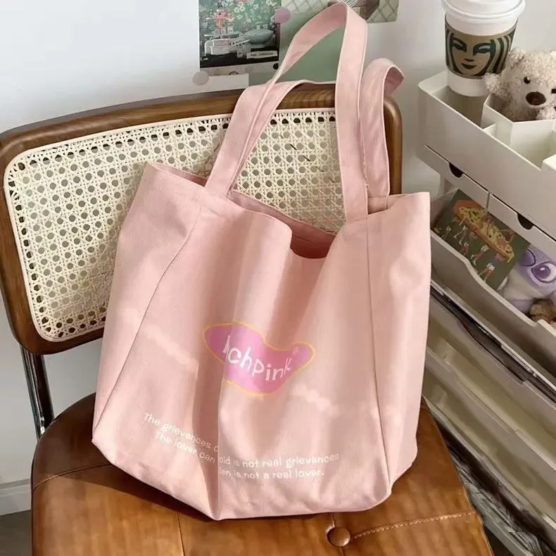 风休闲百搭单肩包女大容量学生帆布包上课通勤托特包网红时尚