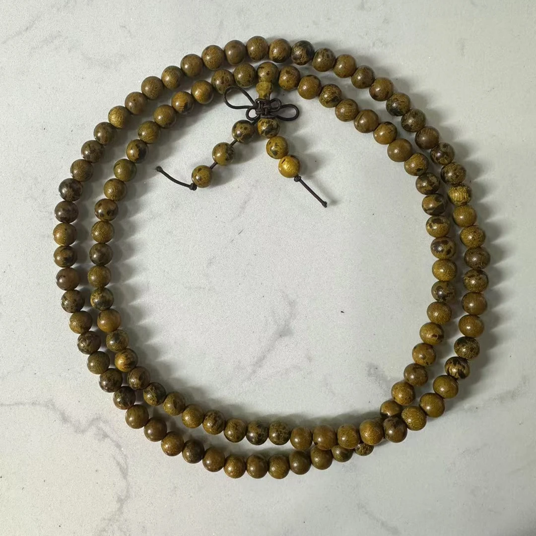 H70 黄油贡木0.8cm多圈手串